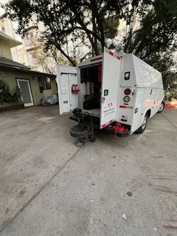 Magnet Plumbing service vehicle on-site for Grease Trap Cleaning in North Hills